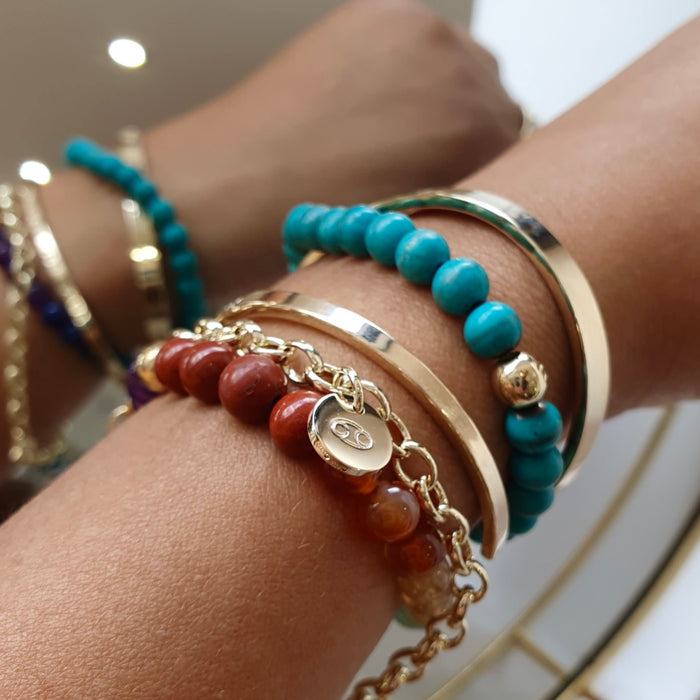 Gold Charm Bracelet With Sun Charm