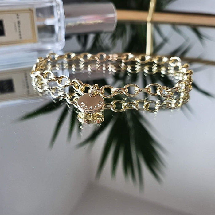 Gold Charm Bracelet With Sun Charm